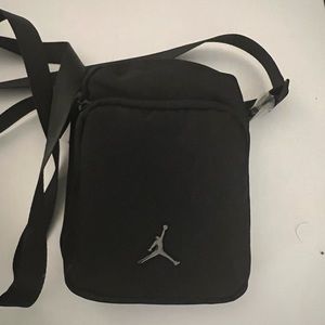Black Jordan crossbody bag new without tag 8 1/2 x 6 inches